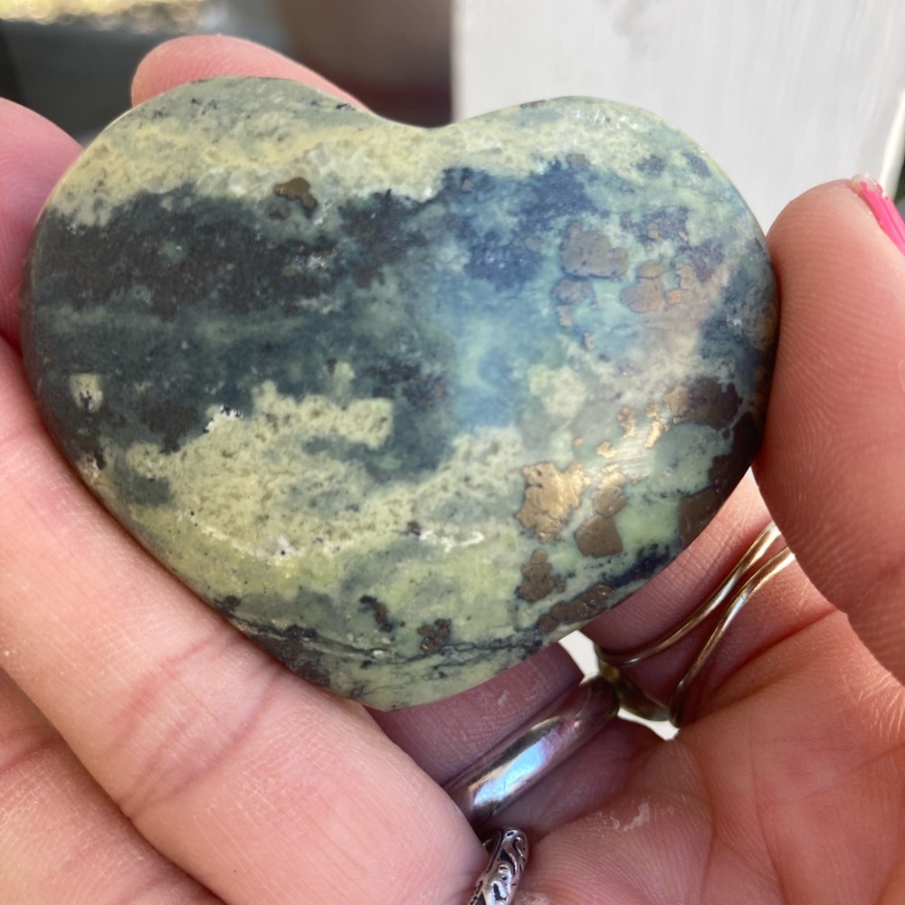 Beautiful serpentine polished heart palmstone